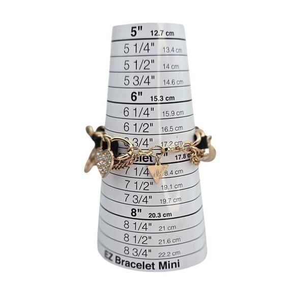 Guess Gold-Tone Charm Bracelet with Black Ribbon Detail - Picture 5 of 8